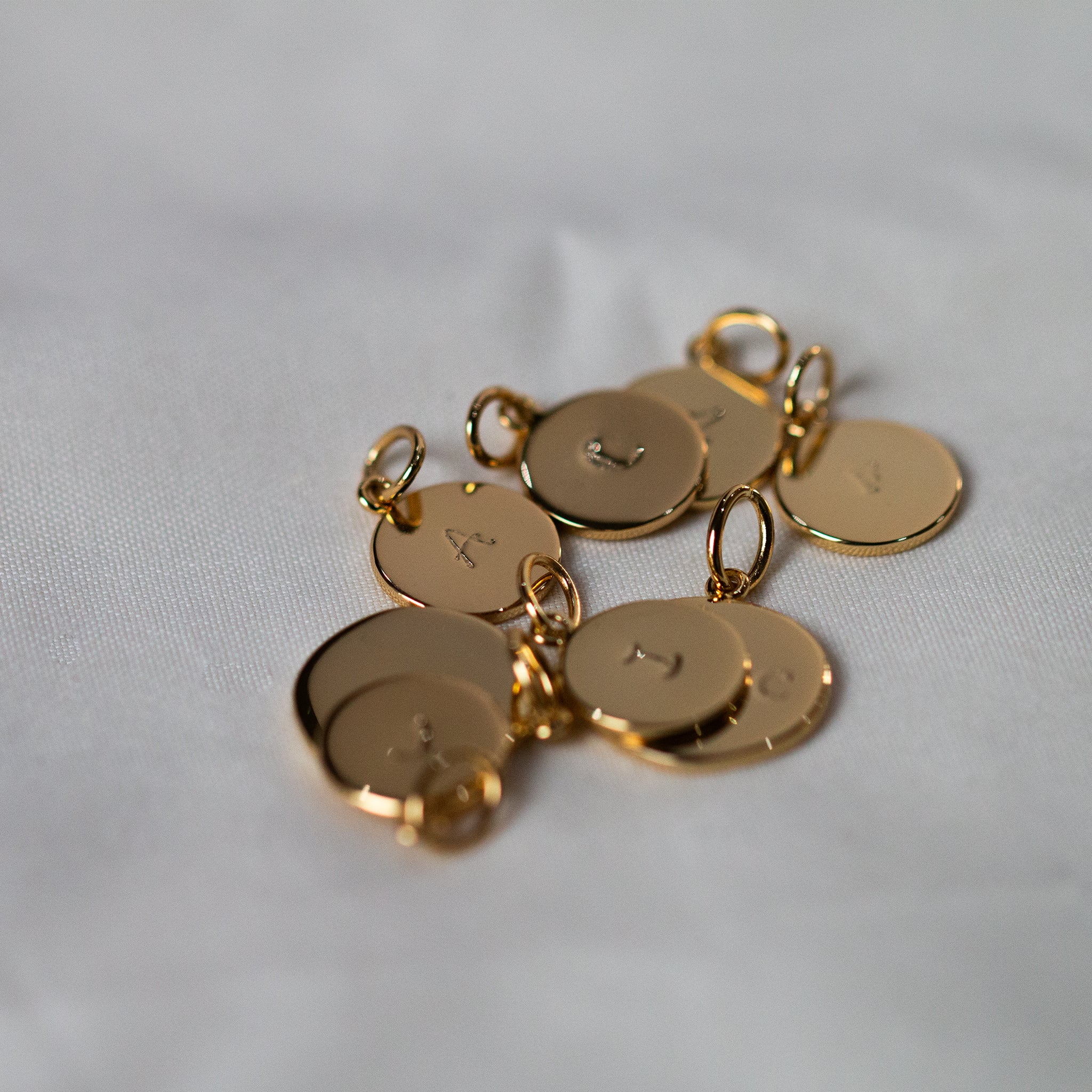 Multiple Gold Pendants - Seek + Find