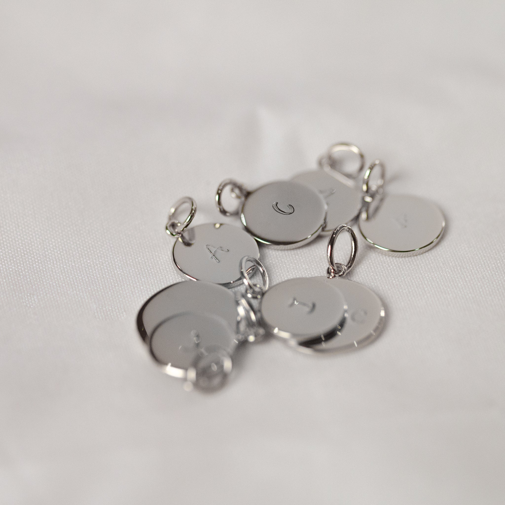 Multiple Silver Pendants - Seek + Find