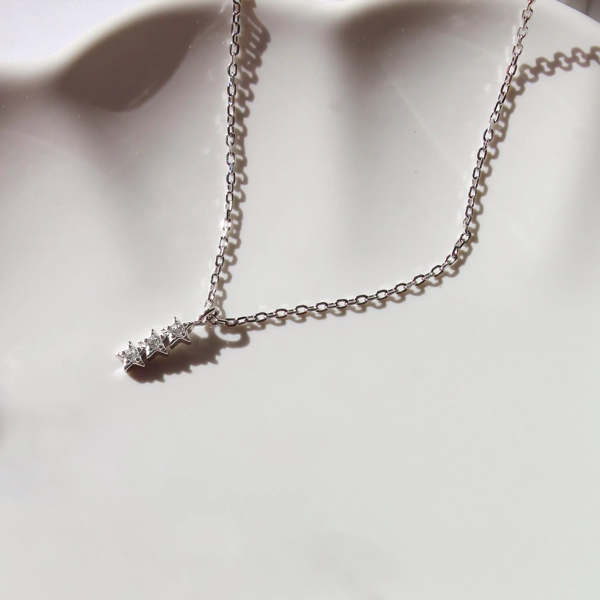 Shine Trio Star Necklace Seek + Find