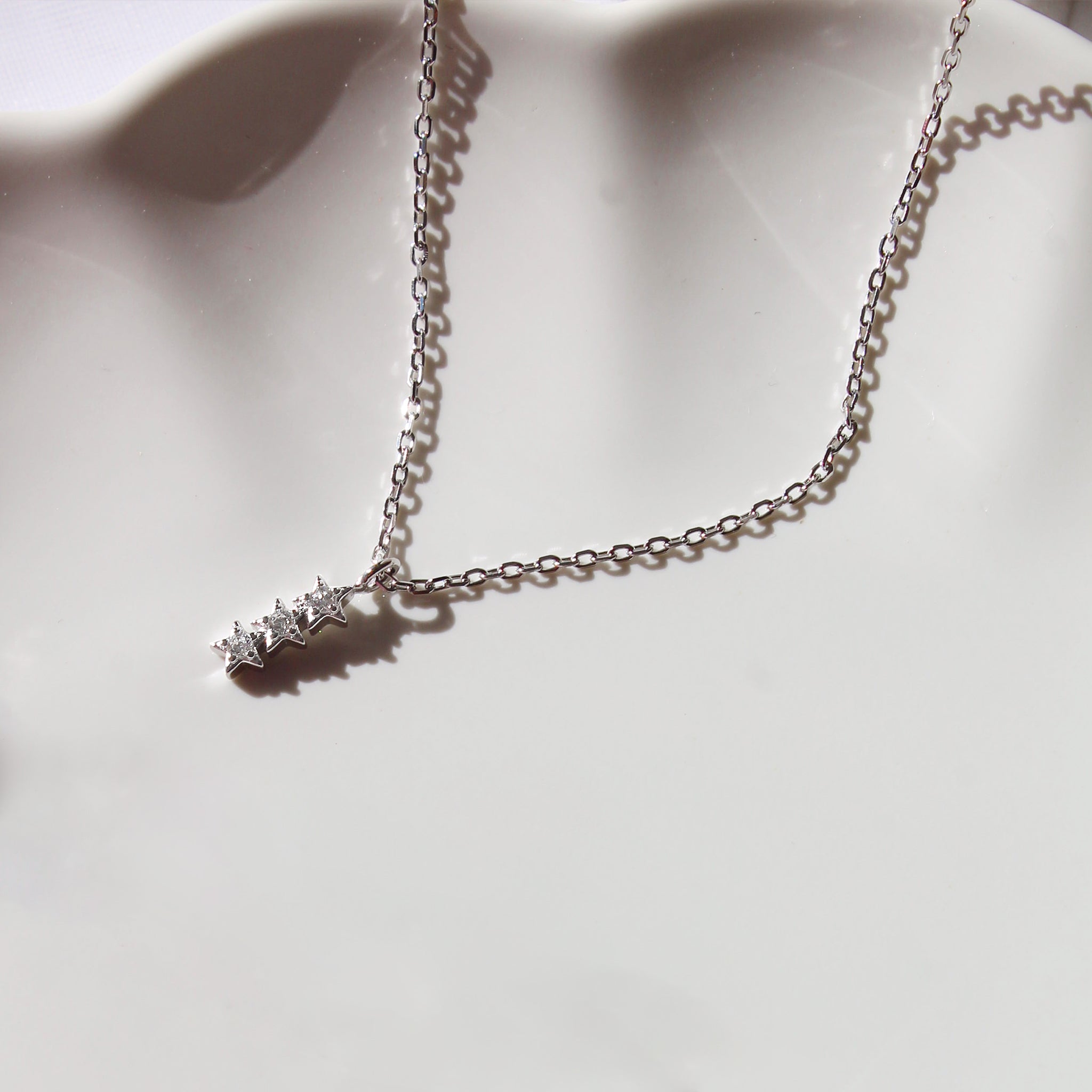 Shine Trio Star Necklace Seek + Find